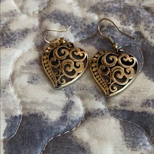Gold heart earrings.